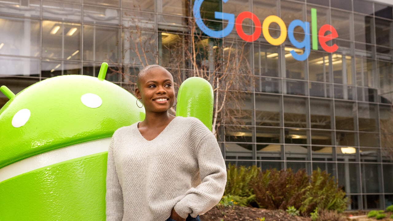 Management alumna Brittany Hayles poses in front of Google's headquarters in California