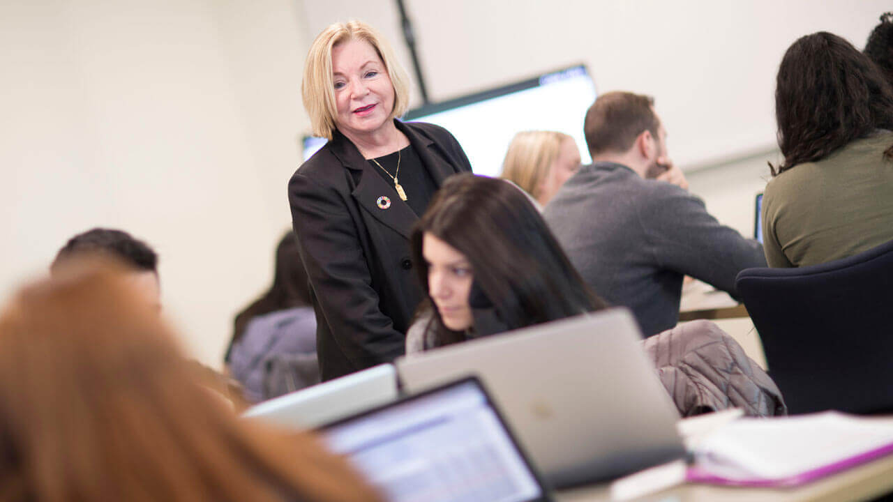 Assistant Teaching Professor of Entrepreneurship & Strategy Margaret Goralski, Ph.D., instructs students in the Center for Communications and Engineering
