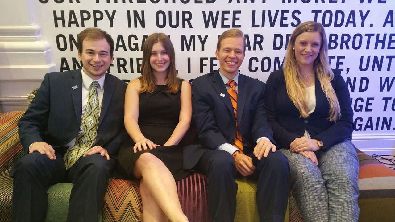 Four members of the Society for Human Resource Management sitting on a couch.