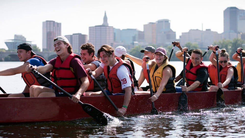 First-year students in the dual-degree BS/MBA (3+1) program in Quinnipiac's School of Business work together to row a dragon boat during a team building event Thursday, August 24, 2017 at Riverside Park in Hartford, Connecticut.