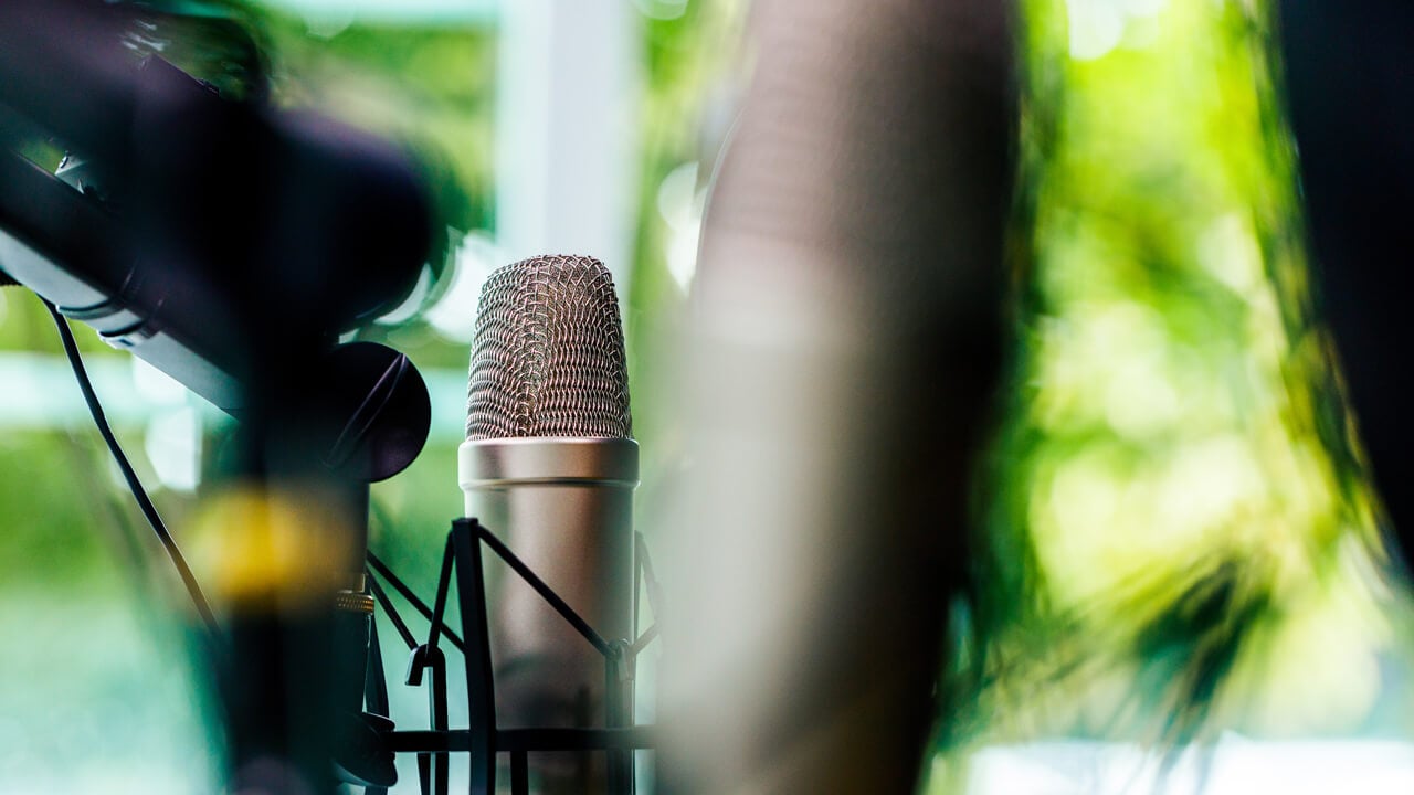 Closeup of a microphone in a podcast studio