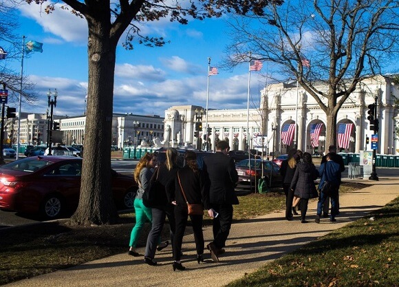 Students walk through Washington D.C., to the presidential inauguration earlier this year.