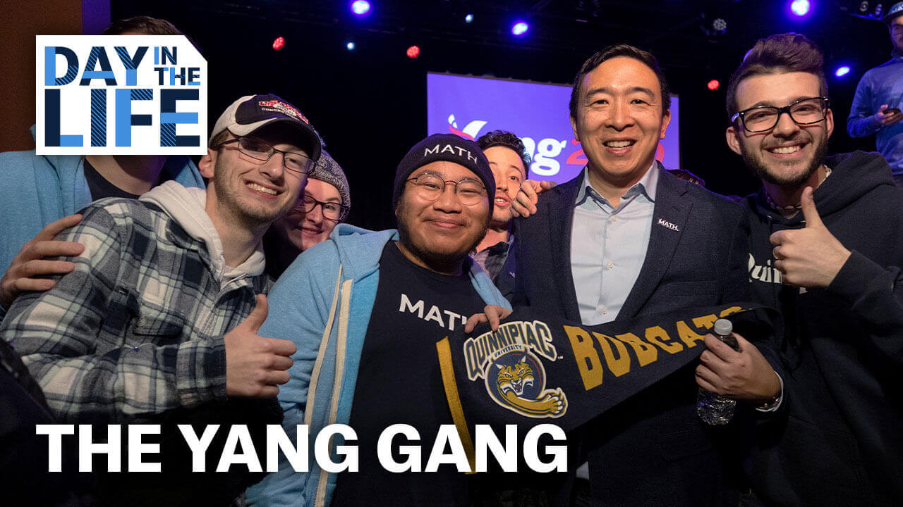 Students take a picture with presidential candidate Andrew Yang, starts video