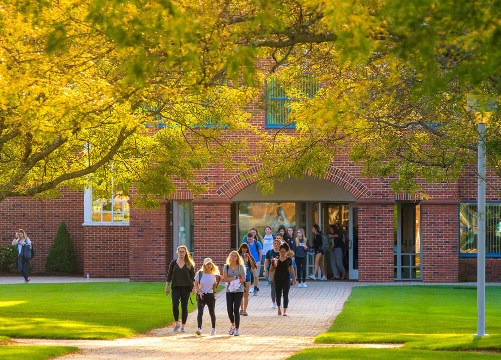An admissions tour group leaves Echlin Center on a fall day